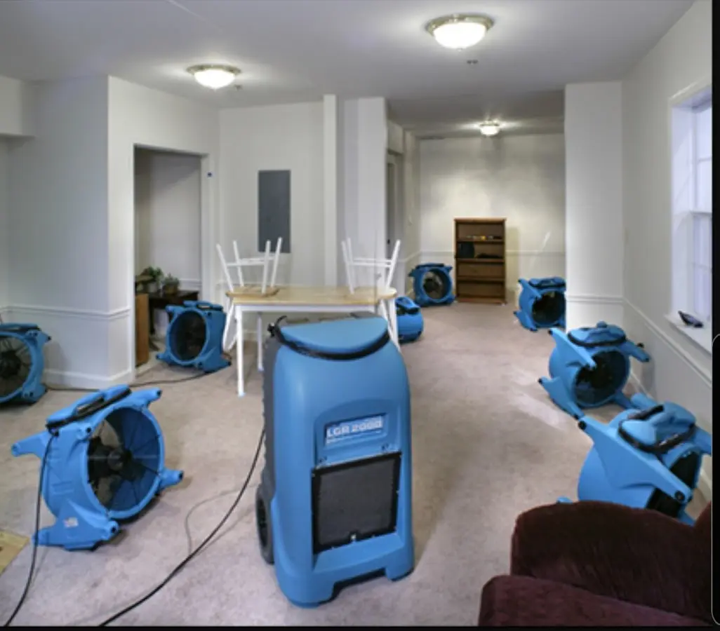Air movers and dehumidifier setup for Water Damage Restoration in Wollochet